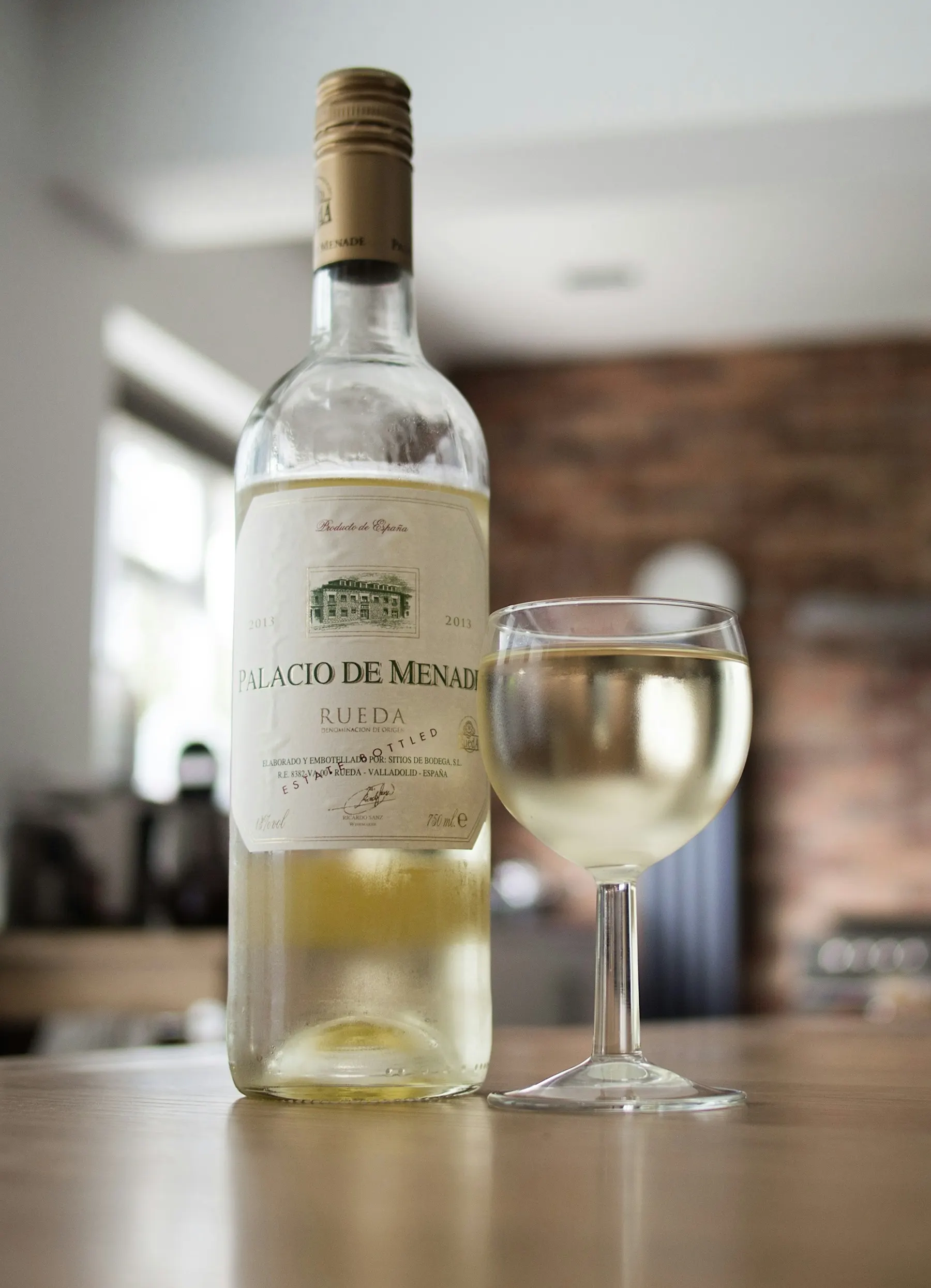 White wine bottle and glass